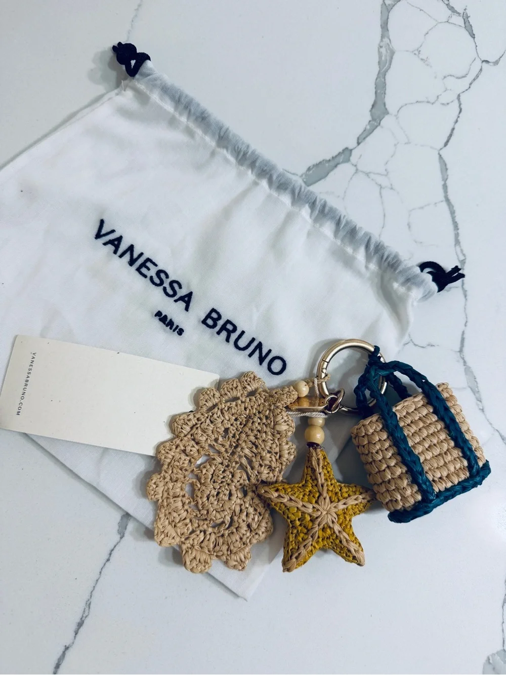 Vanessa Bruno Straw Tote Charm with Brown Leather Handles and Blue Accent